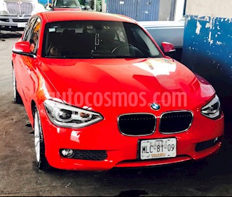 foto BMW Serie 1 5P 118iA usado (2012) color Rojo precio $210,000