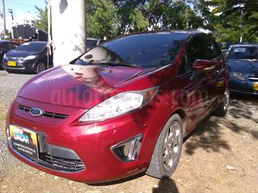 Foto Ford Fiesta LX 5 Ptas. usado (2013) color Rojo precio $33.000.000