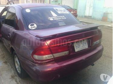 foto Ford Laser GLX Auto. usado (1999) color Rojo precio BoF6.000.000
