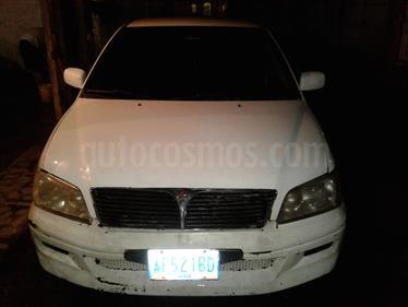 Foto venta carro Usado Mitsubishi Lancer GLXi Auto. (2002) color Blanco Alaska precio BoF35.000