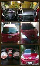 Foto Peugeot 207 Compact XT 1.6L usado (2012) color Vino Tinto precio u$s3.200