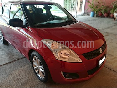 Foto venta Auto usado Suzuki Swift GA (2013) color Rojo precio $125,000