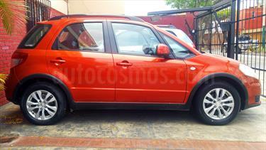foto Suzuki SX4 1.6L usado (2012) color Naranja Metálico precio u$s10,000